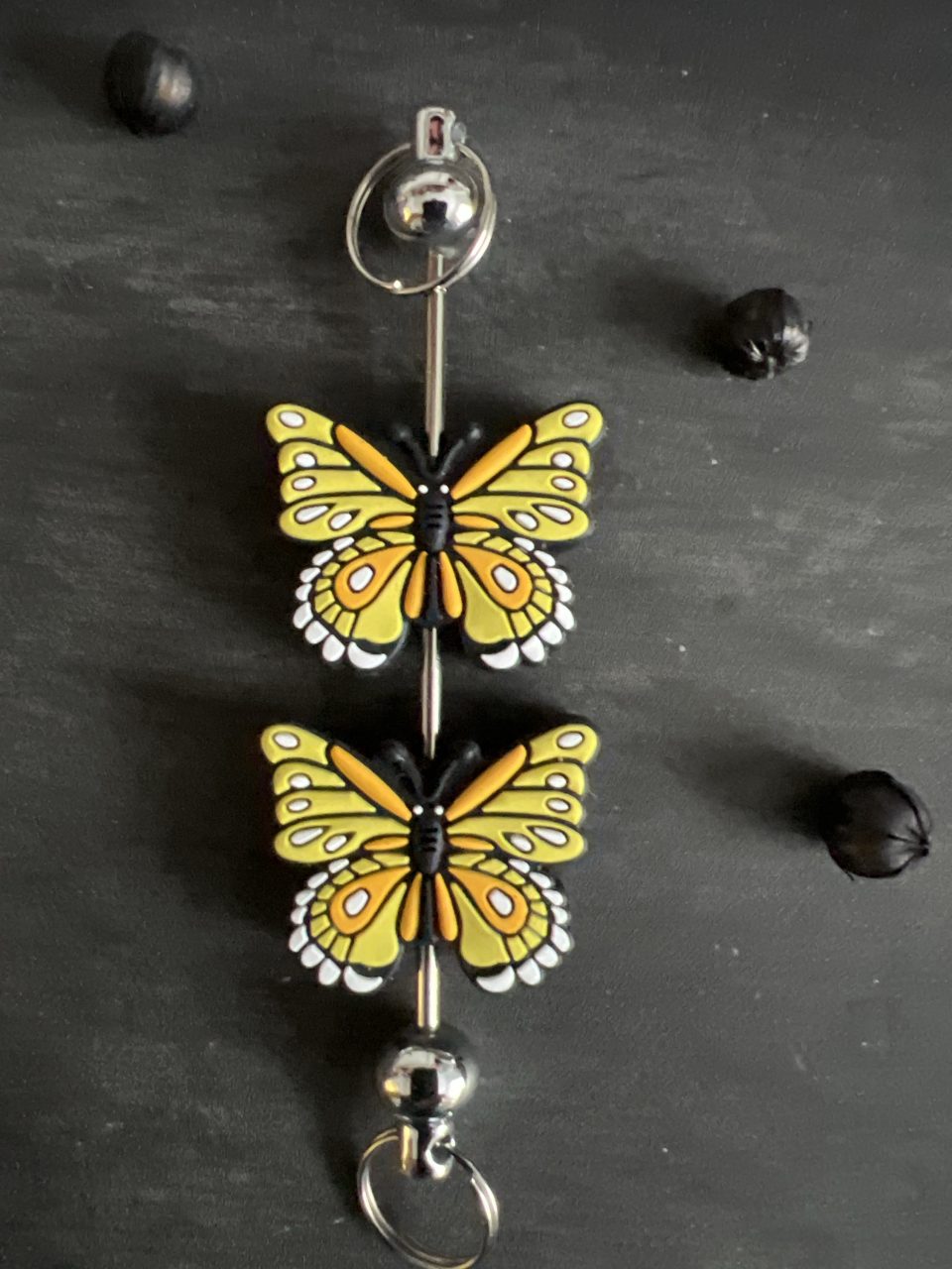 Maschen-/Nadel-Stopper - 1 Set mit 2 Stoppern - Schmetterling gelb